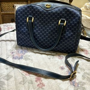 Gucci gg authentic blue handbag. Leather trim and strap. Excellent condition.